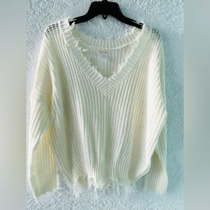 Trendy frayed knit white sweater